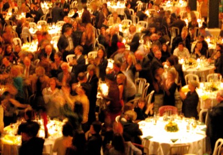 crowd of people at a formal dinner